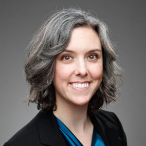 Libby Snipe is a white woman wearing a black blaser